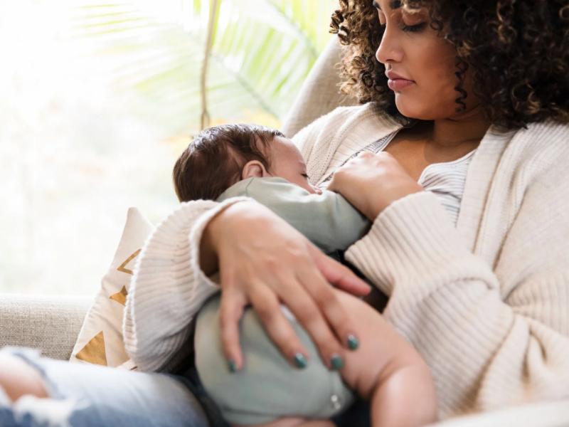 A mom breastfeeding her newborn